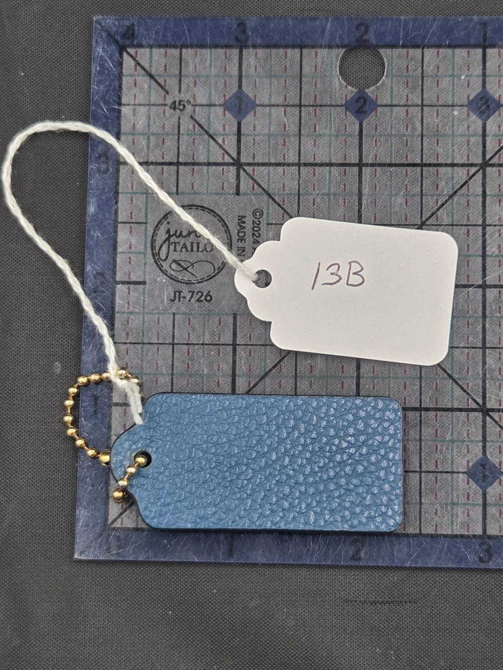 Coach Pebbled Leather Bag Tag in Blue with Gold Ball Chain